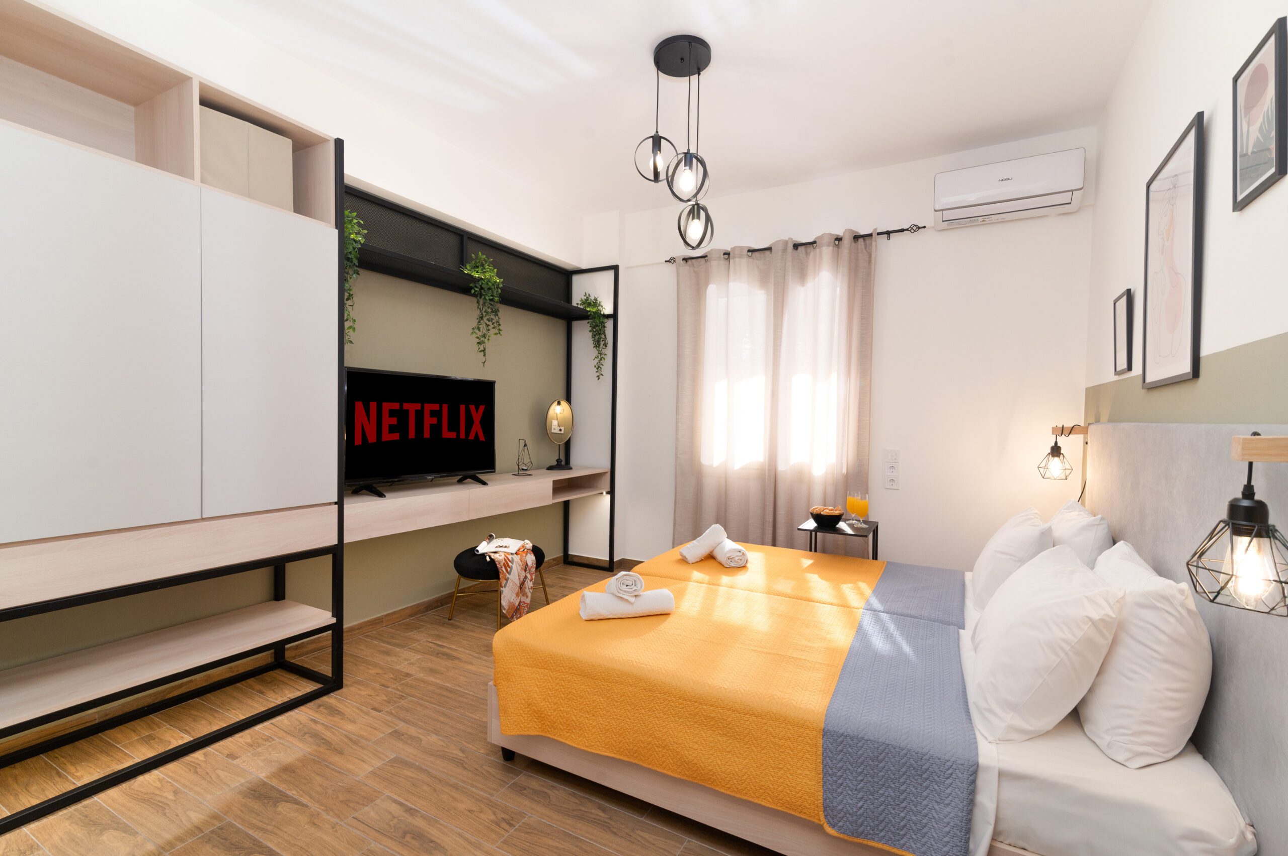 Luxury double bedroom in Agios Nikolaos with premium linens and modern decor at Ria's Residence.