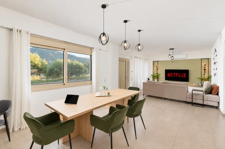 Open Plan Dining and Living Area at Ria's Apartment Agios Nikolaos